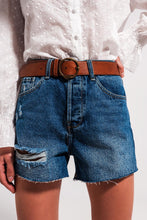Load image into Gallery viewer, Ripped denim shorts - mid wash
