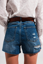 Load image into Gallery viewer, Ripped denim shorts - mid wash
